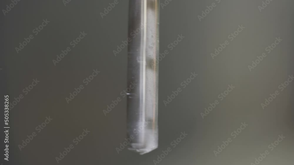 Poster macro shot of a drill bit operating in slow motion in a milling machine