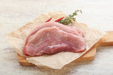 Raw pork schnitzel for roast