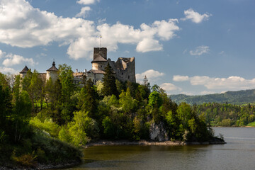 Fototapeta na wymiar Niedzica Castle on Czorsztyn Lake in Pieniny Mountains, Poland at Spring