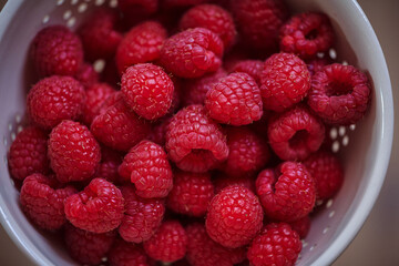 Bowl full of raspberries. Macro photo