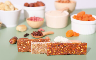 homemade energy bars made of nuts and dried fruits, vegetarian snack, sweet food for vegan. paleo...