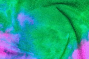 Abstract tie dye neon multicolor folded fabric cloth boho pattern texture for background, sale...