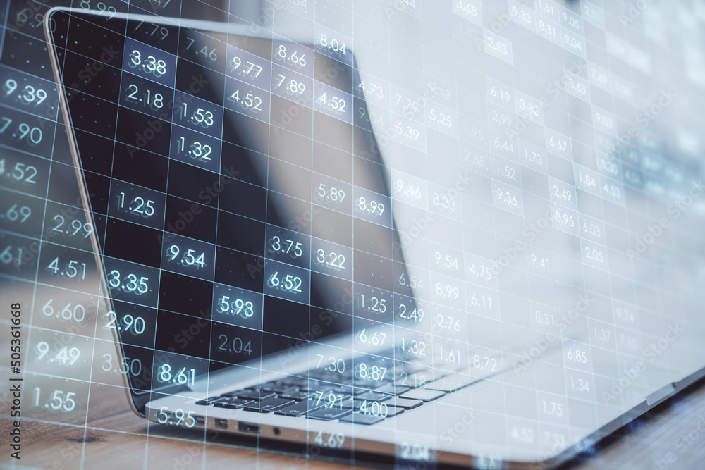 Poster close up of laptop computer on desktop with creative digital financial numbers or index data on blur