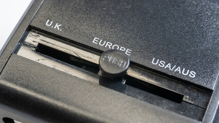 Power jack adapter with a choice of UK, Europe and USA regional patterns. with macro focus