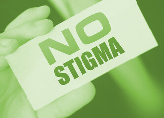 Business card expression say no stigma on businessman hand. Tolerance and equality business concept