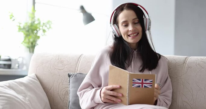 Woman in headphones learning english at home 4k movie