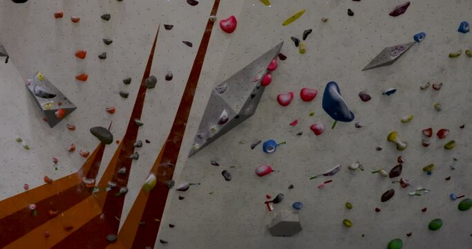 Climbing wall view with colorful grip rocks, bouldering
