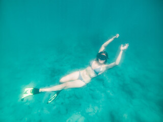 woman in snorkeling mask underwater