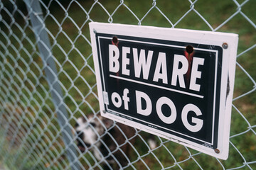 Beware of Dog Sign on Fence - 505379627