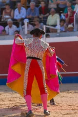 Fotobehang a Spanish bullfighter during his performance in the bullfight © Daniel