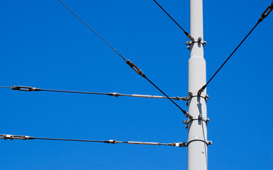 Overhead cables and mast on the railway.