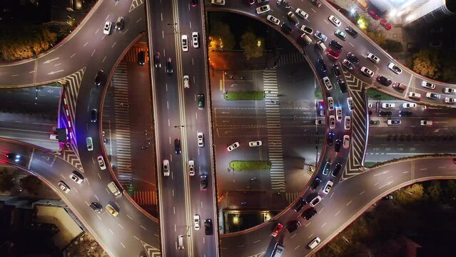 aerial view of road intersection in midtown of hangzhou at night
