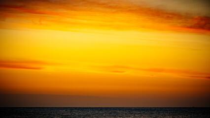 Fototapeta na wymiar Sky at sunrise over sea