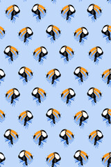 Seamless pattern with hand drawn toucan simple textile background tropical exotic bird with big beak fun kids wrapping paper vector illustration