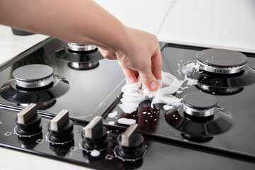 Cleaning and maintaining a gas hob. Degreasing, cleaner