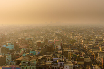 Ariel view of New Delhi with severe air pollution, dusty environment and toxic smog.