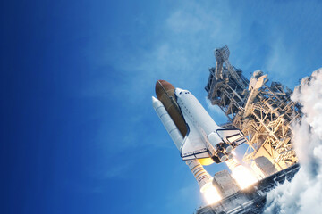 Rocket launch into space Elements of this image furnished by NASA