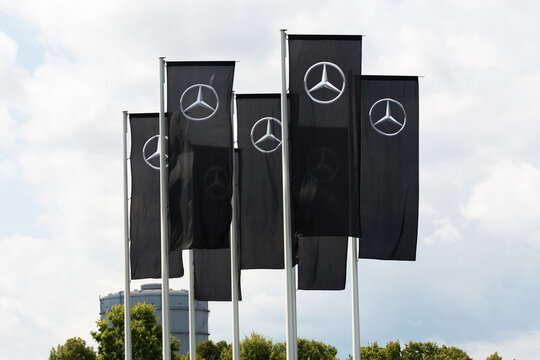 Stuttgart, Germany - Jul 28, 2021: Flags with the Mercedes Star (Mercedesstern) in front of the Daimler headquarter.