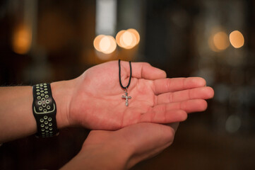 Pectoral golden cross on the palms of the priest.
Golden cross in large size.