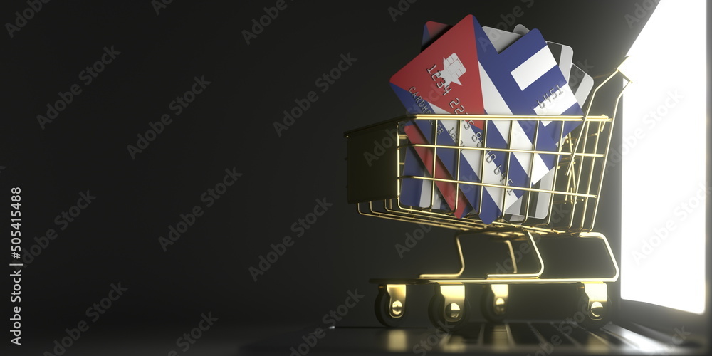 Poster bank card mockups with flags of cuba in a small shopping cart on the laptop. 3d rendering
