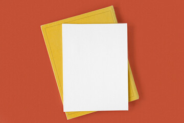 Blank canvas sheet with pen on red orange background, office supplies on table. Top view, flat lay, copy space. Net white page. Card mockup. Elegant layout, template. Soft shadow. Minimal design