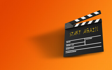 Start Again Message Written On A Clapperboard Against Orange