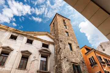 Close-up of an ancient medieval tower, XI century, in Padua downtown called Torre dei Dotti or...