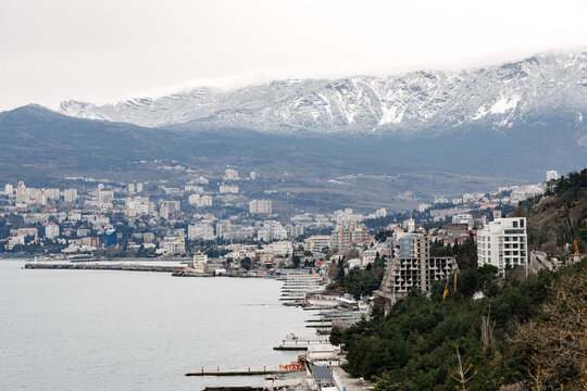 Yalta. Crimea. March 2022. Yalta squatter from the embankment. Coastal houses of the southern resort