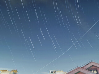 Meteor shower over buildings in Shanghai