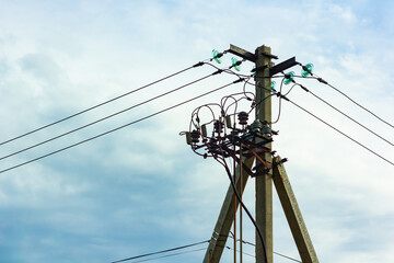 Electric pylon Power Lines and Wires on Blue Sky Background