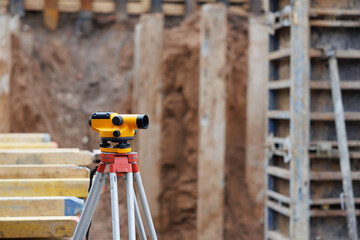 Tachymeter, an instrument for measuring, at a construction site - selective focus with little depth...