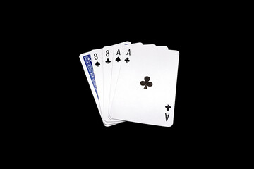 Two pair of eights and aces  with one overturned card. 