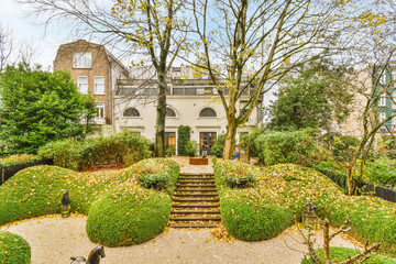 Autumn garden with shrub topiary
