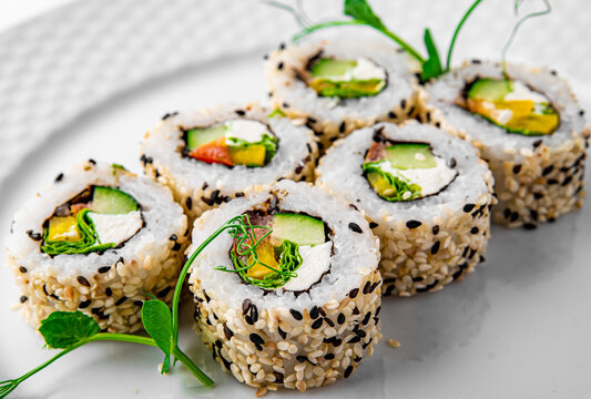 fish sushi roll in white plate
