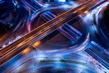 Aerial view of car traffic transportation above circle roundabout road of Drone aerial view fly ,...