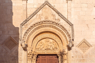 Bezel on the portal of the Church of Saint Mary Maggiore (Santa Maria Maggiore), Monte Sant'Angelo, Foggia, Italy