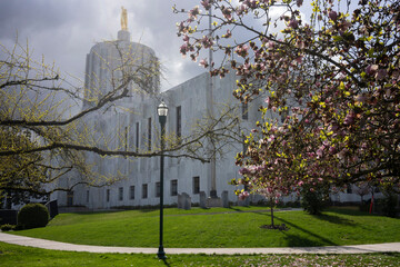 The Oregon State Capitol building against dramatic clouds on a beautiful spring day.