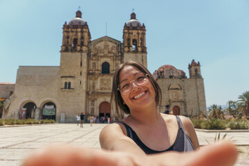 Happy young woman making selfie on oaxaca city mexico