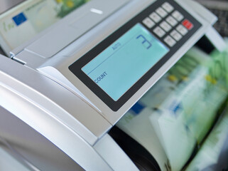 Banknote counter counting Euro bills