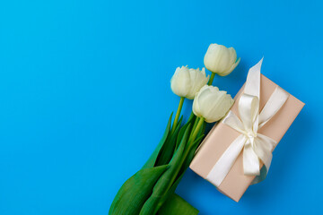  Gift box and Spring flowers on color background. Happy womens day. Happy Mothers day.Hello Spring- Image