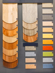 Linoleum colored samples on the wallcatalogue in building materials stores. Flooring samples. 