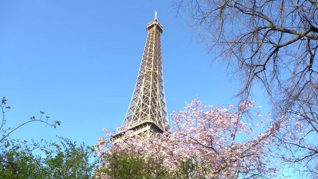 the Eiffel Tower on a beautiful spring day. 4k video.