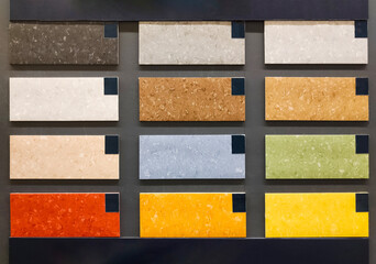 Linoleum colored samples on the wall in building materials stores. Flooring samples catalogue. 