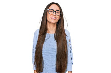 Young hispanic girl wearing casual clothes and glasses looking positive and happy standing and smiling with a confident smile showing teeth