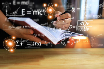 Physics equations floating in the background, hands writing in notebooks on wooden tables, representing the learning teaching or scientific notes of Albert Einstein and Sir Isaac Newton or physics all