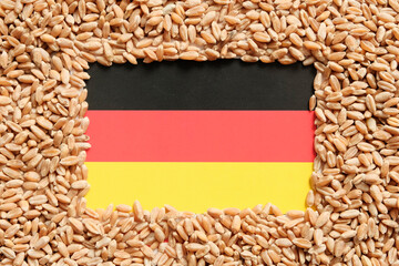 Grains of wheat and the flag of Germany, food crisis, the concept of a global hunger crisis as a...