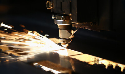 Neon sparks fly out machine head, equipment for metal processing laser metal - obrazy, fototapety, plakaty