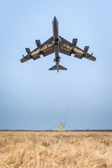 Low pass B-52 airplane