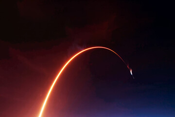 Rocket launch into space Elements of this image furnished by NASA