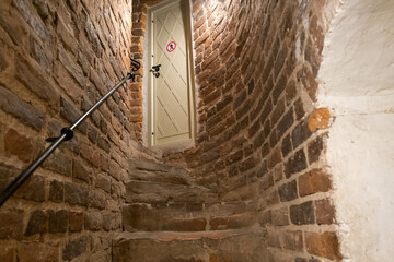 Stepped descent into the dungeon of the medieval castle